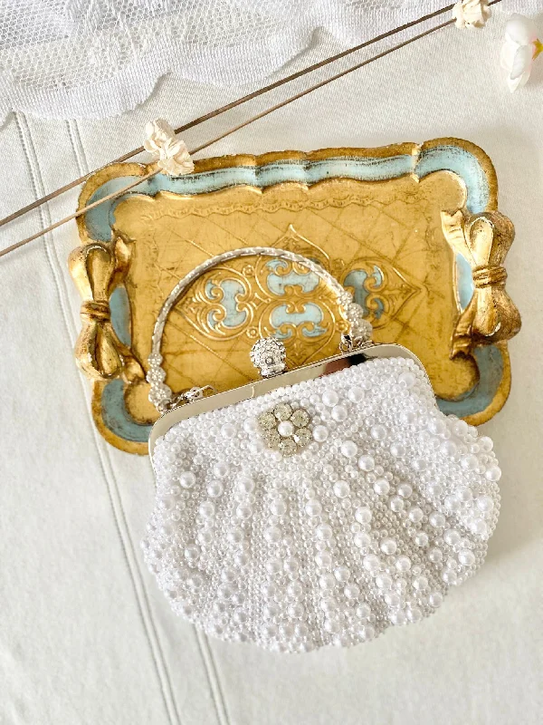 Price Blitz textured dressPearly Occasion Purse